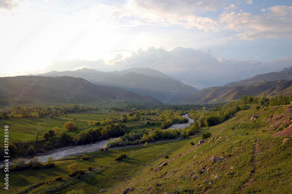 Scenic bright view of Torkent River by spring, Central Kyrgyzia Scenic bright view of Torkent River by spring, Central Kyrgyzia