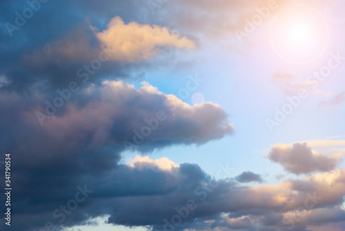 Sun rays in the sky with beautiful clouds