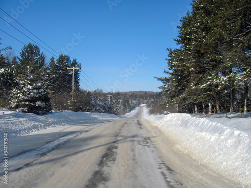 Rural road in winter in Rawdon Quebec Canada