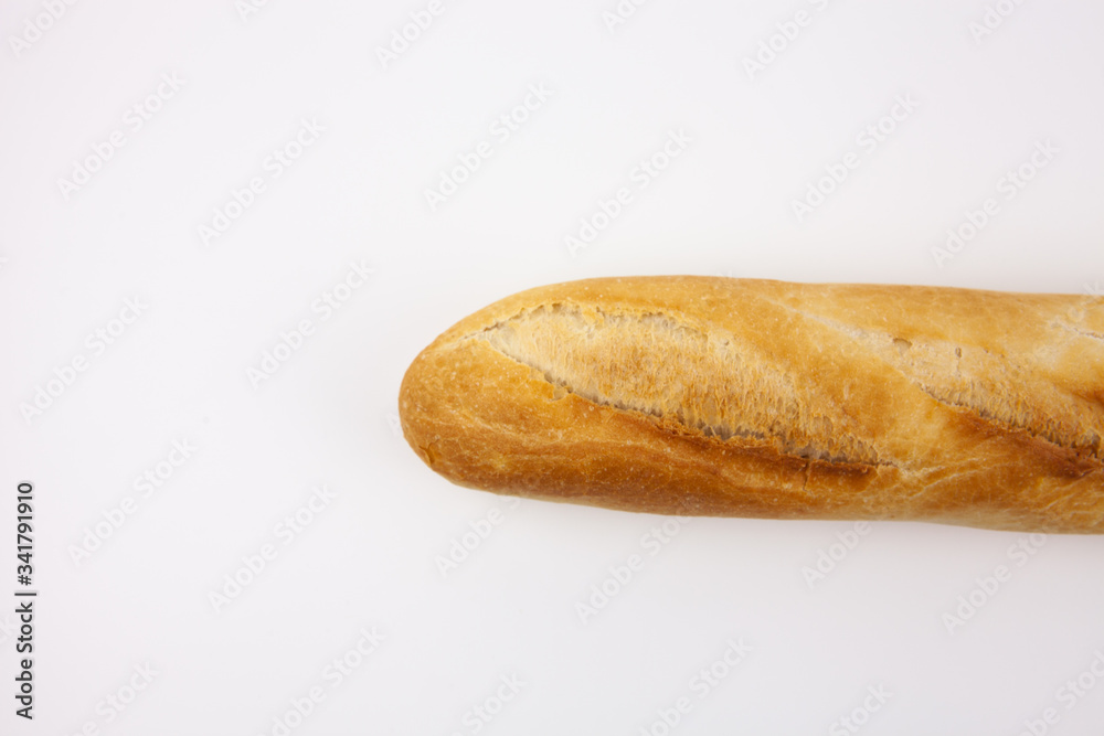 Freshly baked bread on a white background. Perfect for Breakfast. For the presentation of essential goods, bakeries or bread production. Freshly baked bread on a white background. Perfect for Breakfast. For the presentation of essential goods, bakeries or bread production.