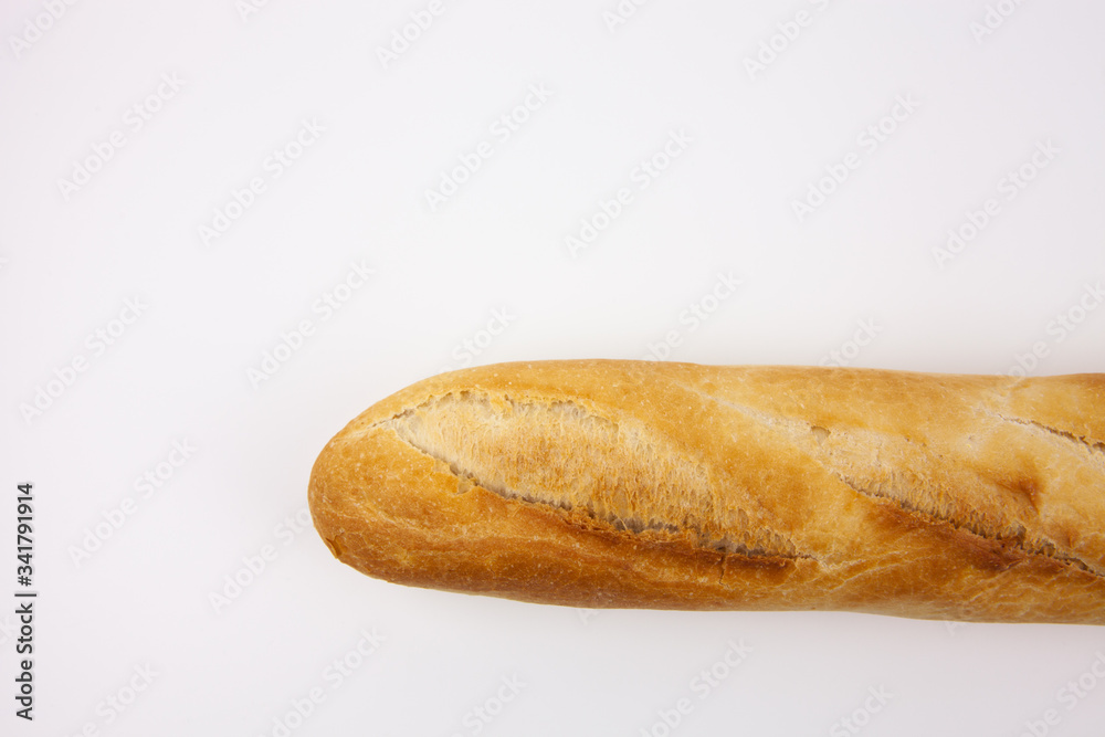 Freshly baked bread on a white background. Perfect for Breakfast. For the presentation of essential goods, bakeries or bread production. Freshly baked bread on a white background. Perfect for Breakfast. For the presentation of essential goods, bakeries or bread production.