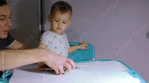 father deals with the child, child education, lessons with a child, home study