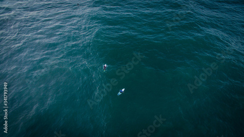 Two surfers in ocean