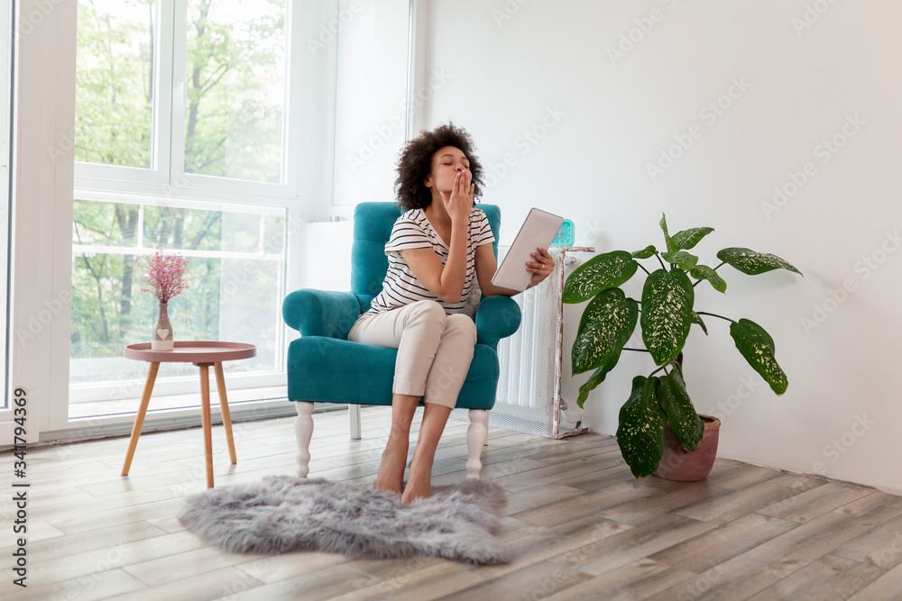 Woman sending kisses on tablet computer video call Woman sending kisses on tablet computer video call