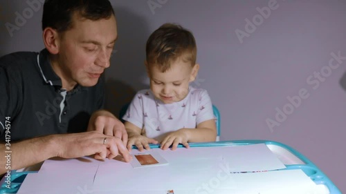 father deals with the child, child education, lessons with a child, home study