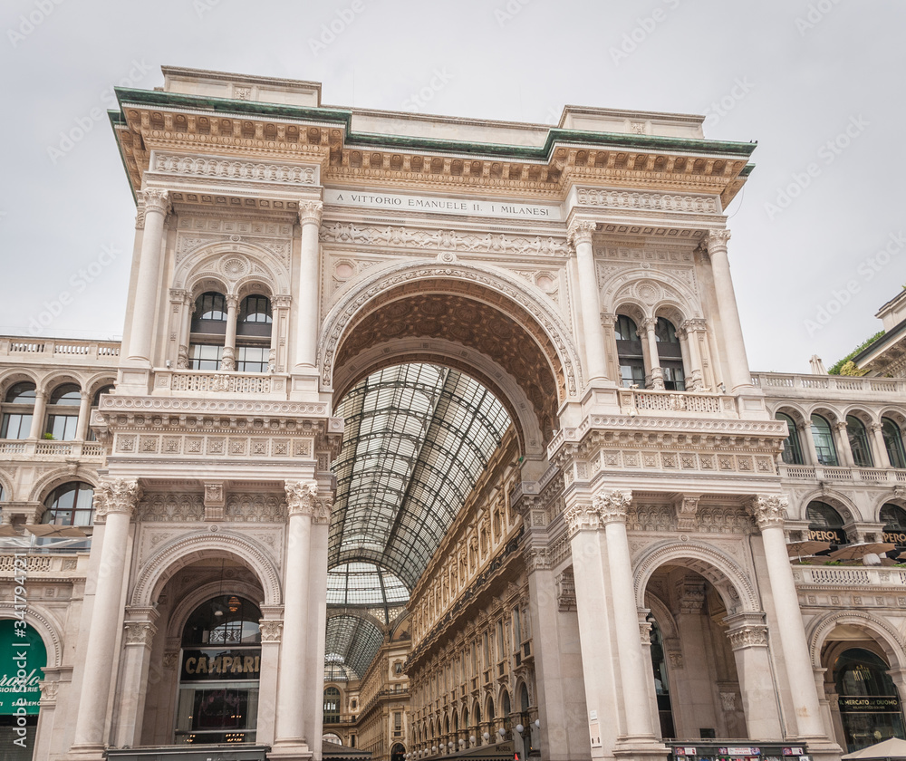 Milan, Italy, April 2020, Galleria Vittorio Emanuele in downtown of the city closed, empty of people during covid19 Coronavirus epidemic