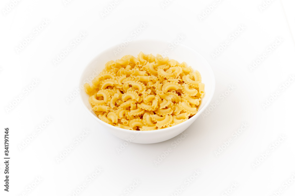 Delicious pasta or penne noodles, isolated on white background. Top view scene, healthy eating or healthy lifestyle. Penne pasta or macaroni in a white bowl, italian cuisine. Delicious pasta or penne noodles, isolated on white background. Top view scene, healthy eating or healthy lifestyle. Penne pasta or macaroni in a white bowl, italian cuisine.