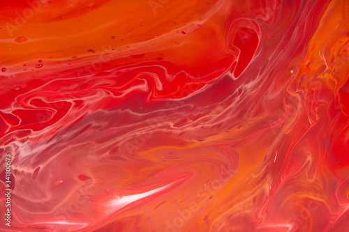 Liquid marble abstract painting in red and white colors