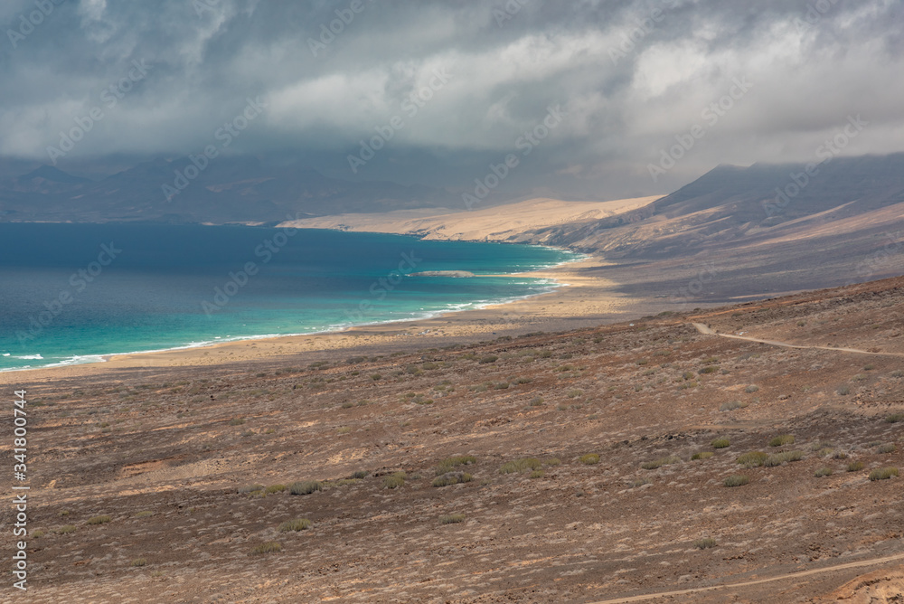 ocean and mountains in the desert of the Canary Island of Fuerteventura ocean and mountains in the desert of the Canary Island of Fuerteventura