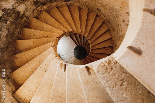 An ancient spiral stone staircase in Fort Mamula in Montenegro