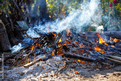 Large smoky bonfire in the garden.