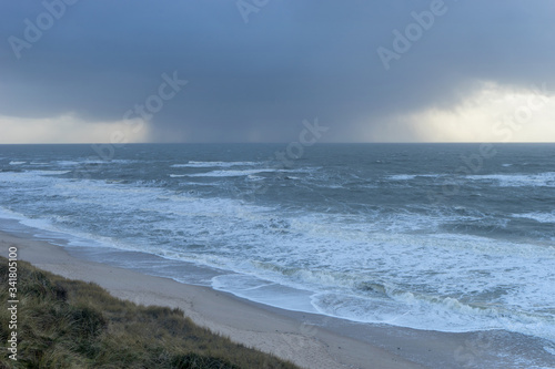 North Sea coast on the island of Sylt with dark storm clouds