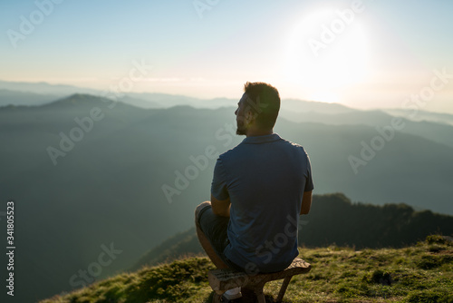 A young man watching the unique view of the Huser plateau