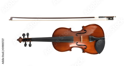 Beautiful classic violin and bow  on white background, top view. Musical instrument