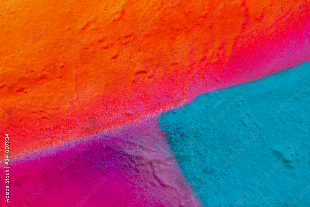 Beautiful bright colorful street art graffiti background. Abstract creative spray drawing fashion colors on the walls of the city. Urban Culture, black , red , orange , yellow, green, blue texture Beautiful bright colorful street art graffiti background. Abstract creative spray drawing fashion colors on the walls of the city. Urban Culture, black , red , orange , yellow, green, blue texture