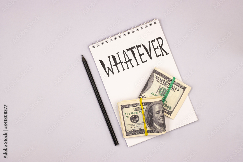 a white notebook with a pencil and the words anything. the concept of the possibility of rapid dynamics of events. anything can happen a white notebook with a pencil and the words anything. the concept of the possibility of rapid dynamics of events. anything can happen