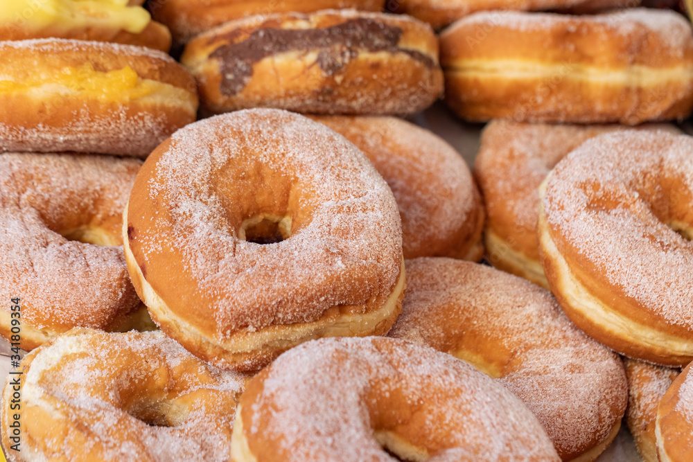 German donuts or krapfen with cream closeup, custard krapfen, sweet donuts
