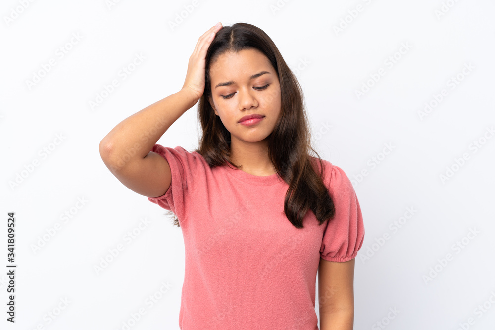 Young Colombian girl over isolated white background with an expression of frustration and not understanding Young Colombian girl over isolated white background with an expression of frustration and not understanding