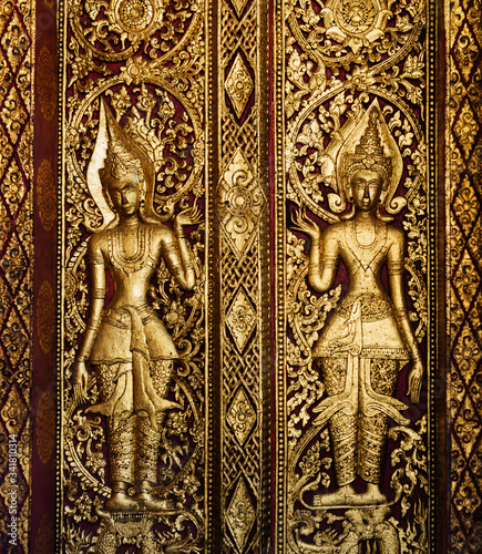 detail of temple door, Wat Mai Suwannaphumaham, Luang Prabang, Loas, Southeast Asia