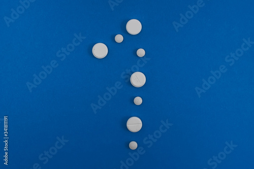 Sign number one Made From Capsules Over Blue Background