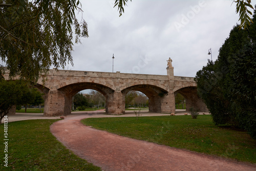 Columns and arches of stone bridge