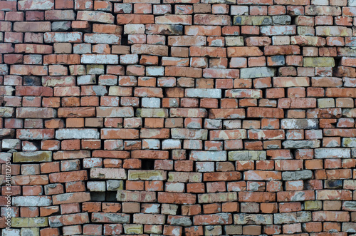 Brickwork. Wall of old brick. Brick structure. Stone structure