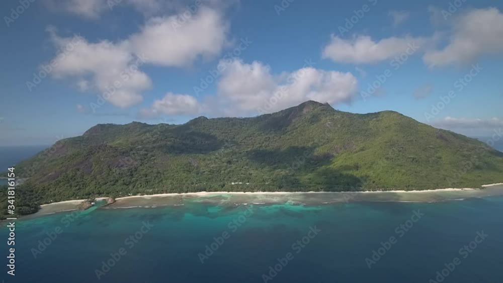 Tropical island with white sand beaches and crystal clear water, holiday paradise Tropical island with white sand beaches and crystal clear water, holiday paradise