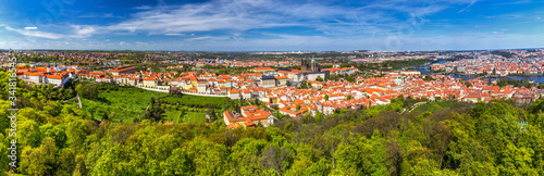 Skyline aerial view of Prague old town, Charles bridge, Prague Castle and St Vitus Cathedral and red roofs. Prague, Czech republic.