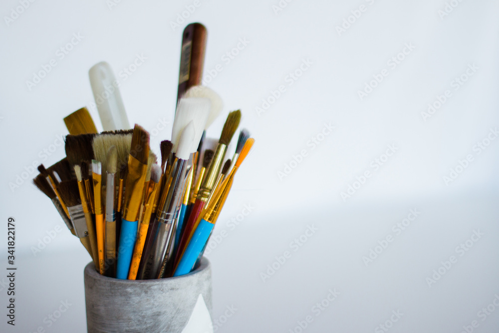 Jar of paintbrushes