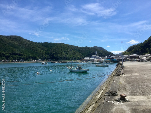 The Sakitsu village on the Amakusa Islands, famous for the church seen from the sea photo