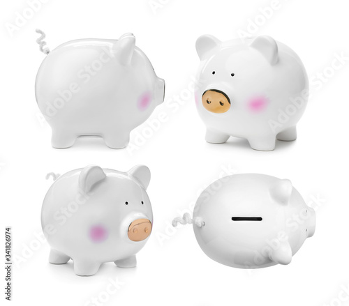 Set with ceramic piggy bank on white background