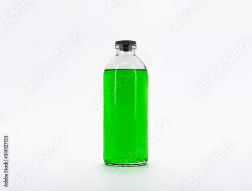 Green color pharma grade empty glass bottle with white cap. High Resolution. Mock up