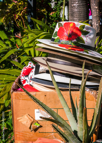 A street vendors stack of summer tourist hats, Puerto Vallarta photo