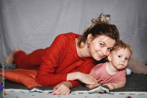 A young mother with her one-year-old little son