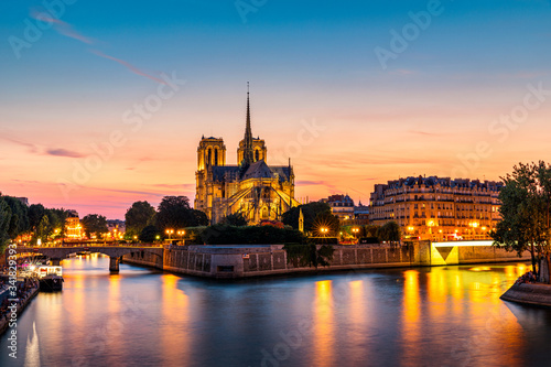 Notre Dame de Paris cathedral, France. Notre Dame de Paris Cathedral, most beautiful Cathedral in Paris. Picturesque sunset over Cathedral of Notre Dame de Paris, destroyed in a fire in 2019, Paris. © daliu