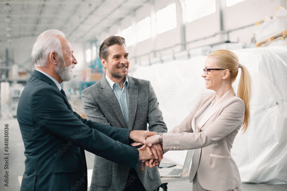 Successful team. Business team putting their hands together. Successful team. Business team putting their hands together.