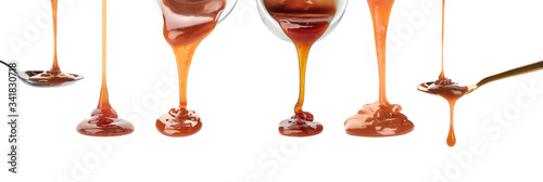 Φωτογραφία Set with pouring caramel sauce onto white background