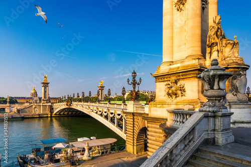 Photography Pont Alexandre III bridge over river Seine in the sunny summer morning