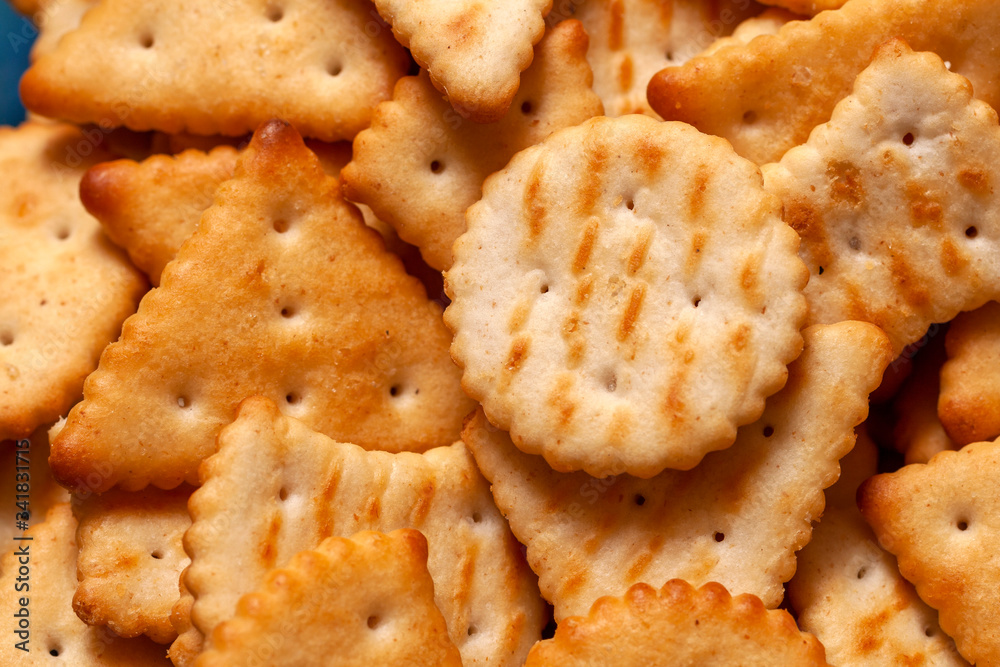 Close up shot of salty crackers on a plate Close up shot of salty crackers on a plate
