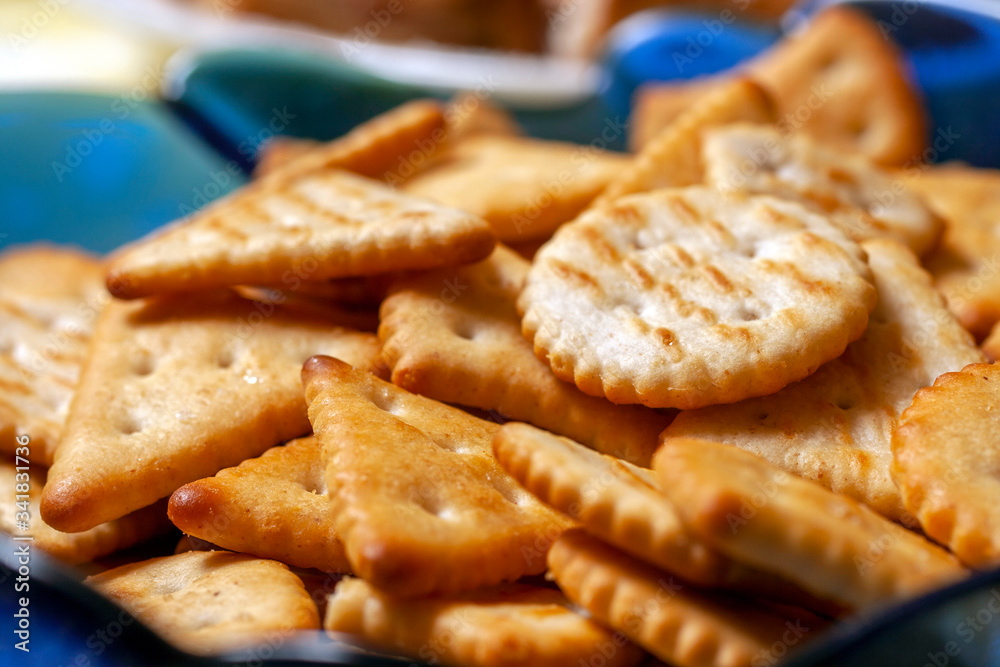 Close up shot of salty crackers on a plate Close up shot of salty crackers on a plate