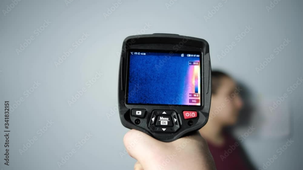 Thermal camera vision of woman, Coronavirus high fever control, Covid-19 protection concept Thermal camera vision of woman, Coronavirus high fever control, Covid-19 protection concept