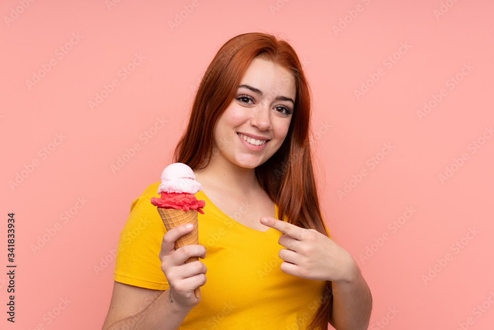 Young girl with a cornet ice cream over isolated background and pointing it Young girl with a cornet ice cream over isolated background and pointing it