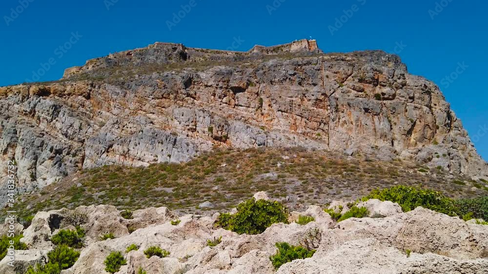 Rocks, mountain against the blue sky. Parallax effect, camera stabilized. Amazingly beautiful landscape of the island of Crete, Greece. Rocks, mountain against the blue sky. Parallax effect, camera stabilized. Amazingly beautiful landscape of the island of Crete, Greece.