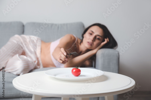 Young woman suffering from ...