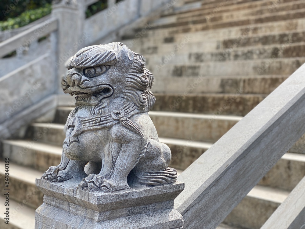 Lionstone figure in Chinese temple Lionstone figure in Chinese temple