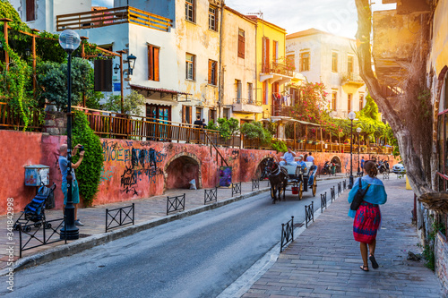 Fototapeta Naklejka Na Ścianę i Meble -  Charming streets of Greek islands, Crete. Street in the old town of Chania, Crete, Greece. Beautiful street in Chania, Crete island, Greece. Summer landscape. Travel and vacation.