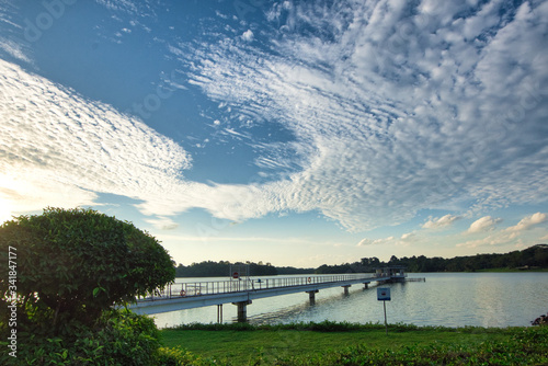 A view of cloudy sky at Lower Seletar Reservoir, a reservoir and leisure park located in the northeastern part of Singapore.  photo