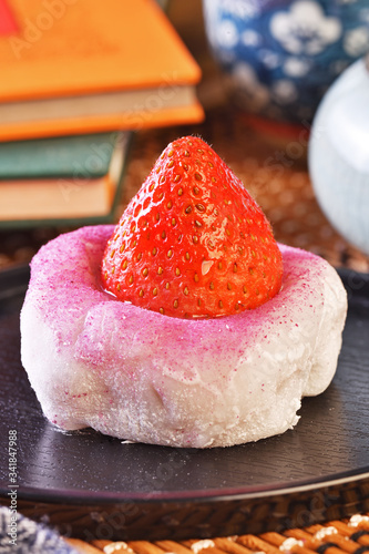 Strawberry Daifuku on black tray   photo