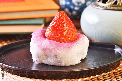 Strawberry Daifuku on black tray   photo