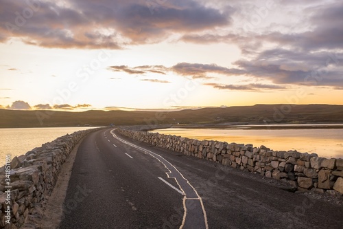 Kyle of Tongue Causeway Road A838 at Sunset as Part of the North Coast 500 Route in Sutherland, Scotland photo